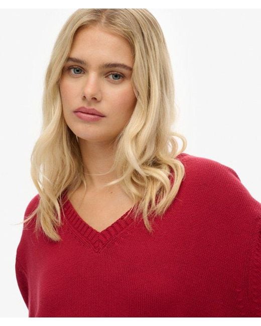 Femme Pull Col V Rayé Overtaille Taille Superdry en coloris Red