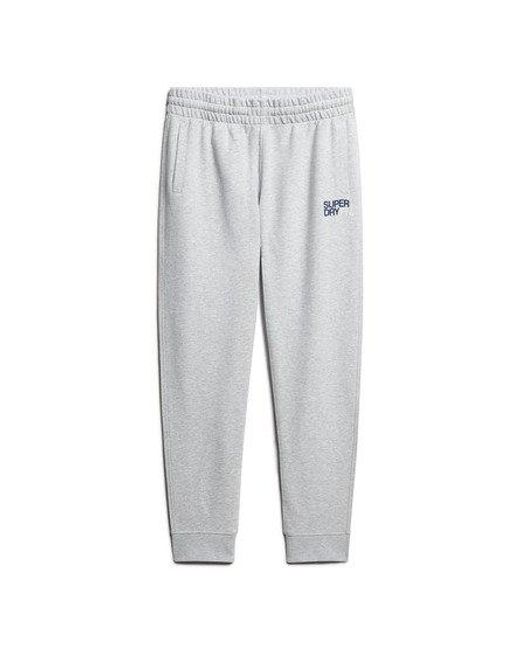Pantalon de survêtement fuselé à logo sportswear Superdry pour homme en coloris White