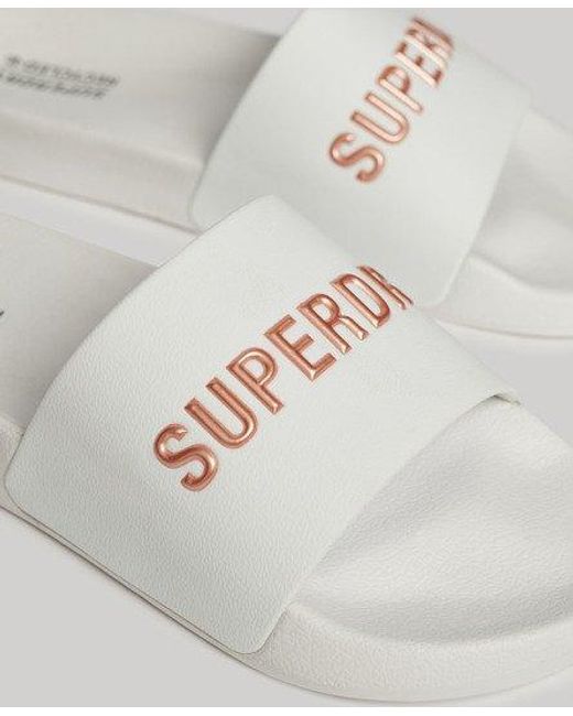 Claquettes de piscine à logo code Superdry en coloris Metallic