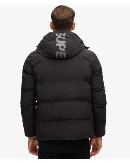 Superdry Wijdvallende Pufferjas Met Capuchon in het Black voor heren