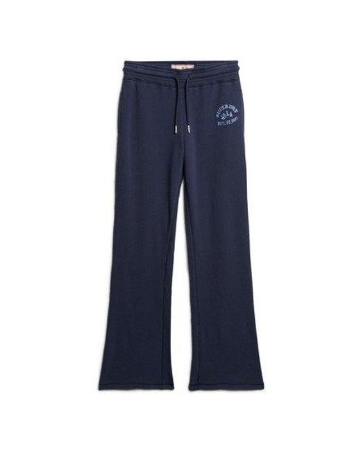 Pantalon de survêtement taille basse évasé athletic essentials Superdry en coloris Blue