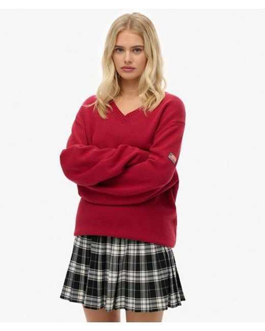Femme Pull Col V Rayé Overtaille Taille Superdry en coloris Red