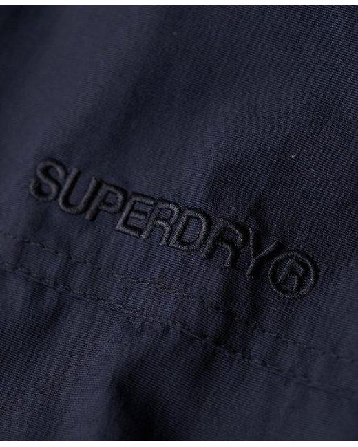 Superdry Blue Classic Embroidered Logo Surplus Nylon Hooded Bomber Jacket for men