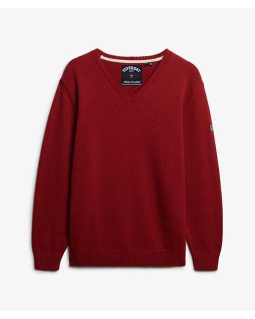 Femme Pull Col V Rayé Overtaille Taille Superdry en coloris Red