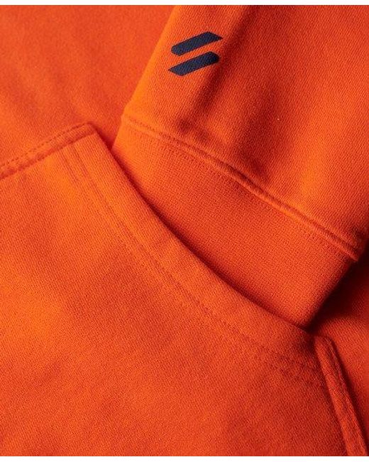 Sweat à capuche ample à logo sportswear Superdry pour homme en coloris Orange