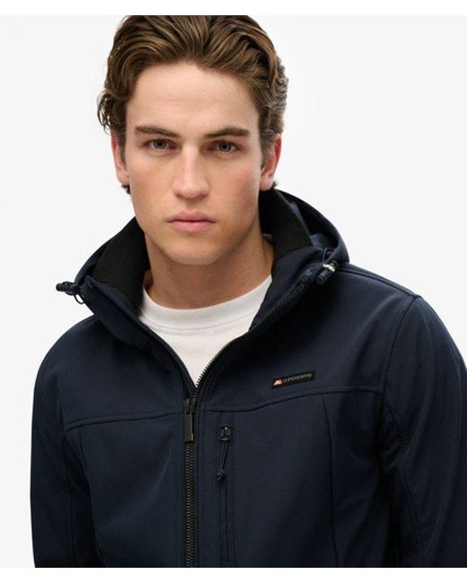 Superdry Blue & Co Lightweight Embroidered Logo Hooded Soft Shell Trekker Jacket for men