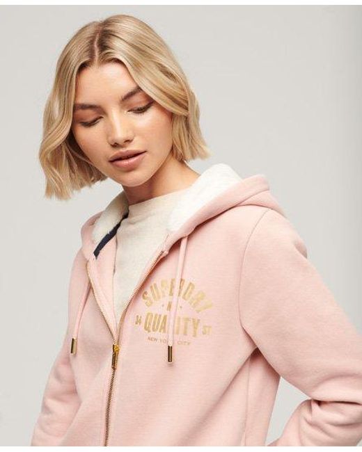 Sweat à capuche zippé avec logo métallisé luxe Superdry en coloris Pink