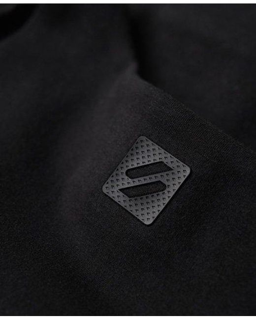 Brassière élastiquée tech Superdry en coloris Black