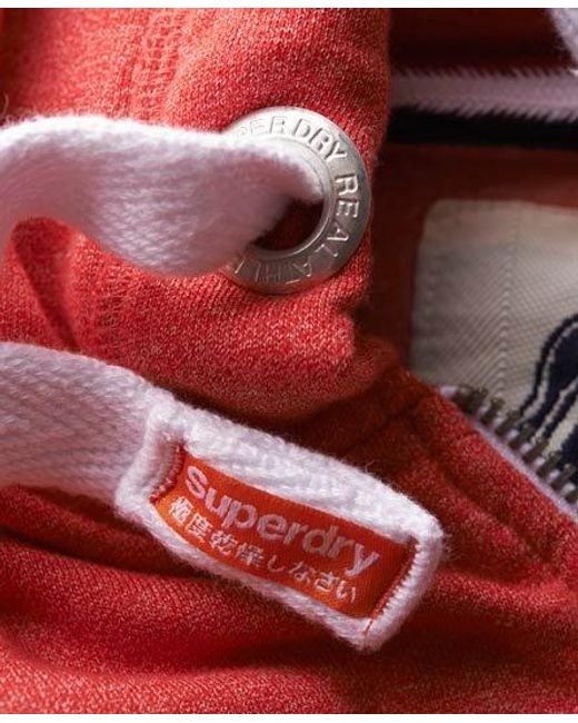 Superdry Red Track & Field Zip Hoodie Tag