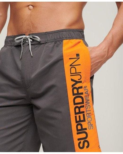 Short de surf recyclé 48 cm à logo sportswear Superdry pour homme en coloris Gray