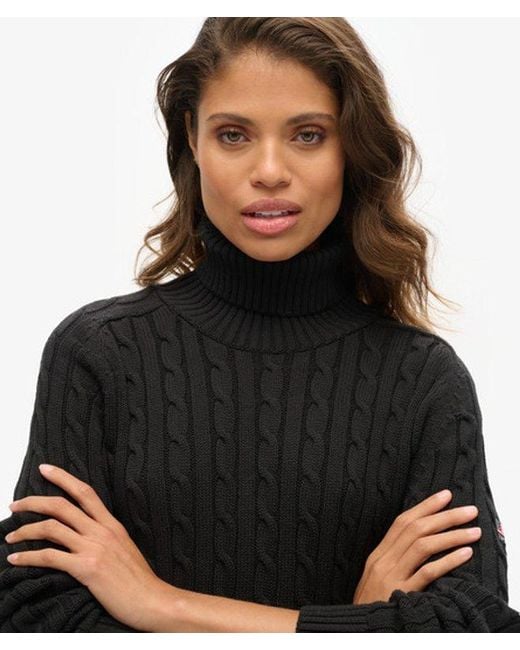 Pull ample torsadé à col roulé Superdry en coloris Black