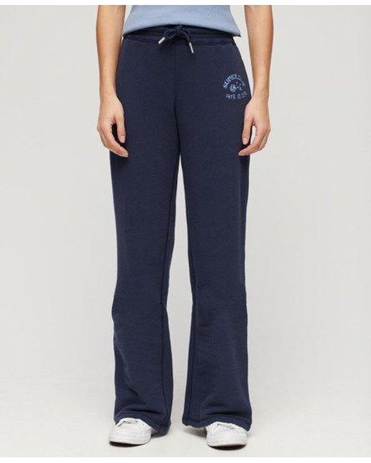 Pantalon de survêtement taille basse évasé athletic essentials Superdry en coloris Blue