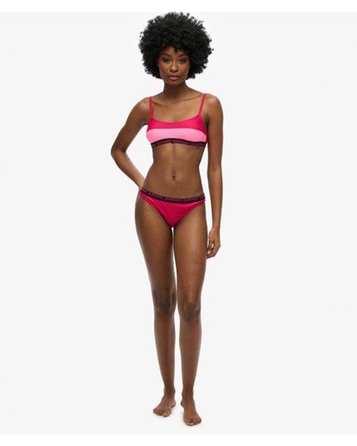 Bas de bikini espiègle élastique Superdry en coloris Pink