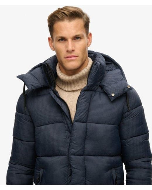 Superdry Blue & Co Classic Quilted Ripstop Long Puffer Coat for men