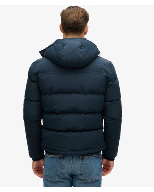 Superdry Blue Classic Quilted Everest Short Hooded Puffer Jacket for men