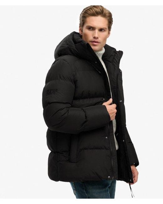 Superdry Black Hooded Five Baffle Sports Puffer Jacket for men