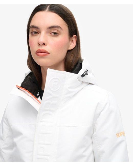 Veste à capuche ultimate windbreaker Superdry en coloris White