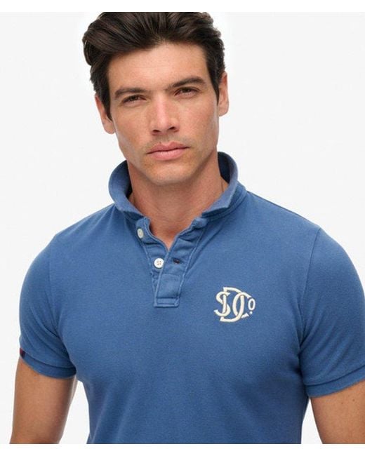 Superdry Blue & Co Vintage Athletic Embroidered Polo Shirt for men