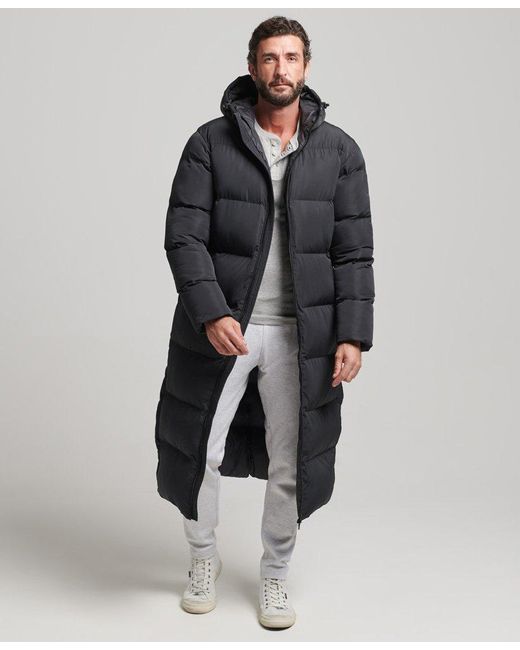 Superdry Extra Long Puffer Coat Black for Men | Lyst UK