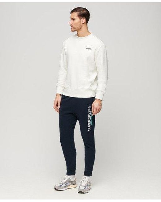 Superdry Taps Toelopende joggingbroek Met Sportswear-logo in het Blue voor heren