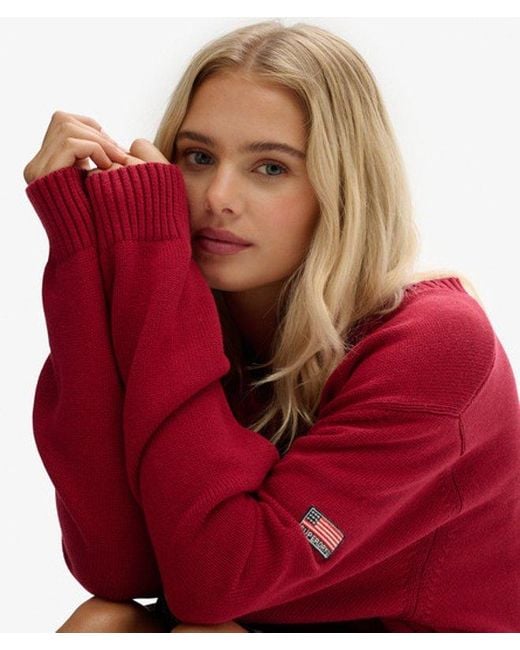 Femme Pull Col V Rayé Overtaille Taille Superdry en coloris Red