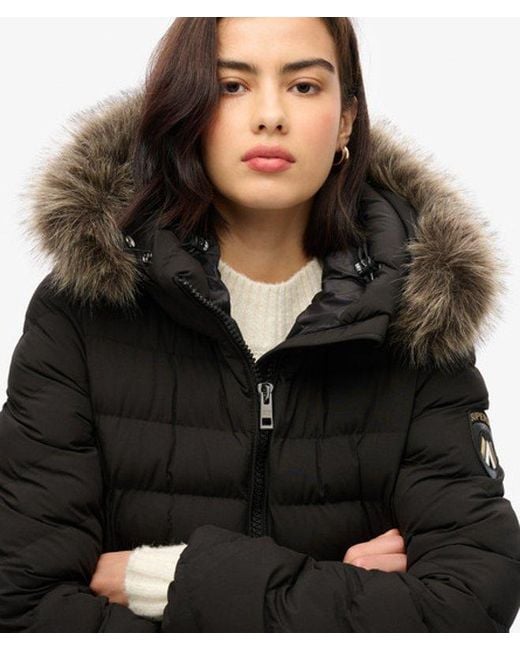 Veste longue à capuche en fausse fourrure fuji Superdry en coloris Black