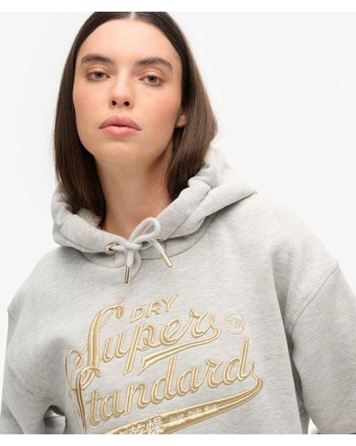 Robe à capuche et logo métallisé luxe Superdry en coloris White