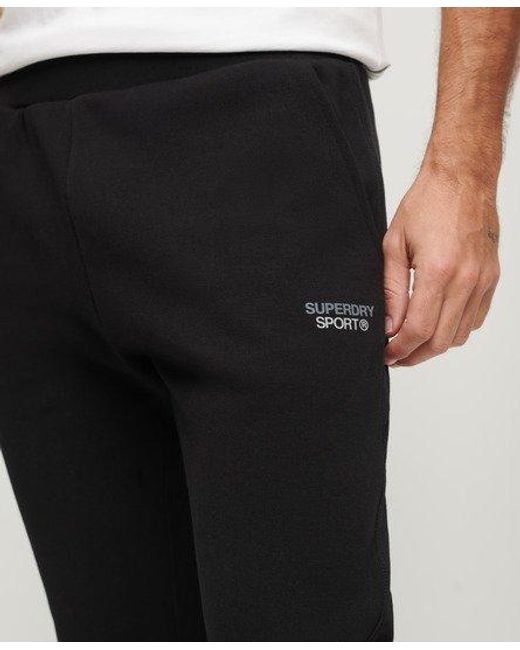 Pantalon de survêtement fuselé sport tech Superdry pour homme en coloris Black