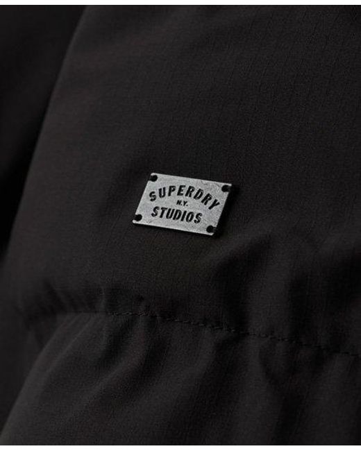 Superdry Black Classic Logo Badge Longline Hooded Puffer Coat for men