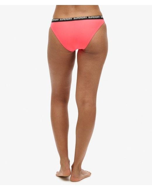 Bas de bikini classique élastique Superdry en coloris Red