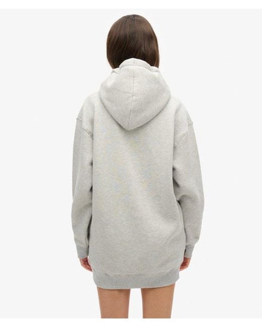 Robe à capuche et logo métallisé luxe Superdry en coloris White