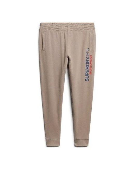 Superdry Taps Toelopende joggingbroek Met Sportswear-logo in het Natural voor heren