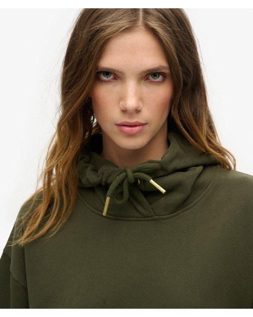 Robe à capuche avec strass effet tatouage Superdry en coloris Green