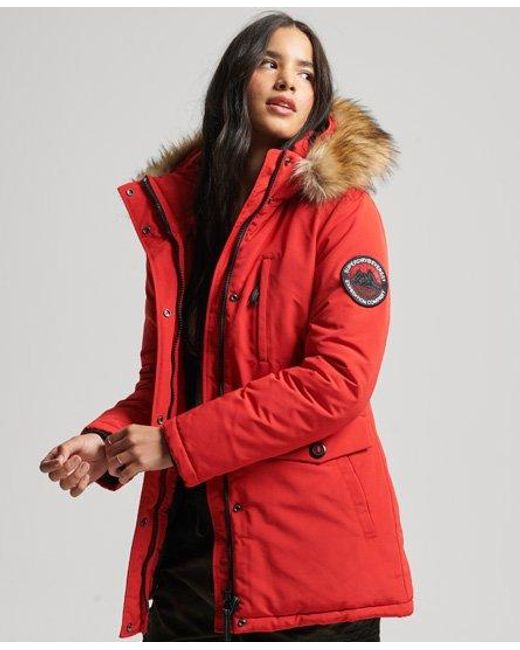 Superdry Hooded Everest Faux Fur Parka Coat in Red | Lyst
