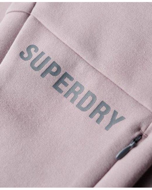 Sweat à capuche zippé décontracté sport tech Superdry en coloris Pink