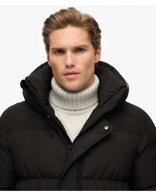 Superdry Black Hooded Five Baffle Sports Puffer Jacket for men