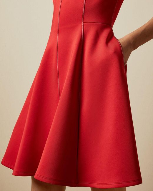 red sleeveless skater dress