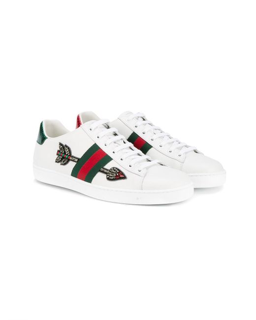 Gucci shop arrow trainers