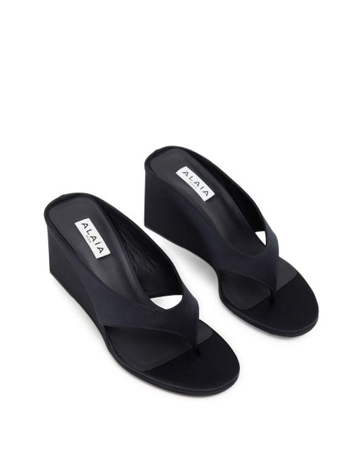 Alaïa Satin Thong Mules in Blue | Lyst