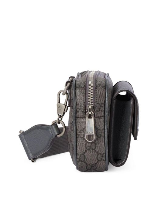 Ophedia Leather-Trimmed Monogrammed Coated-Canvas Belt Bag