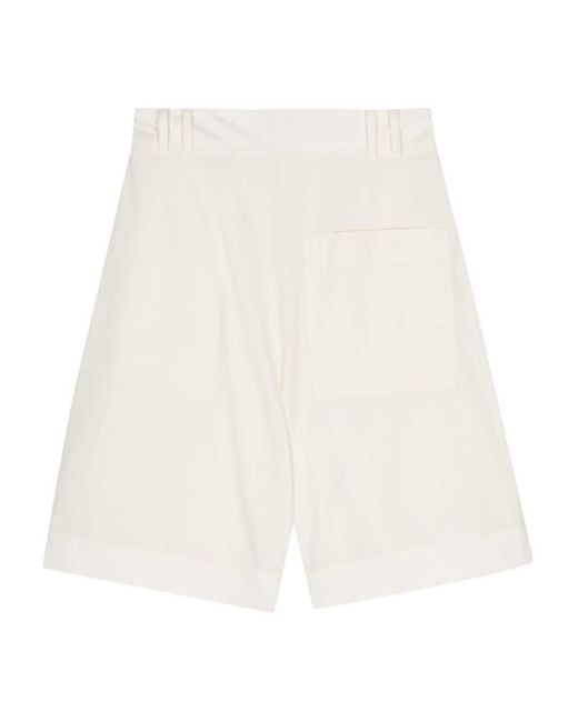 Studio Nicholson White Tailored Flared Shorts