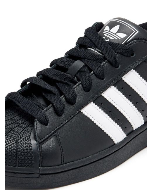 Adidas Black Low Top Rubber Sole Sneakers for men