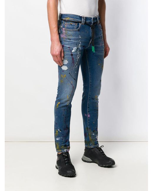 Off white paint splatter hot sale jeans