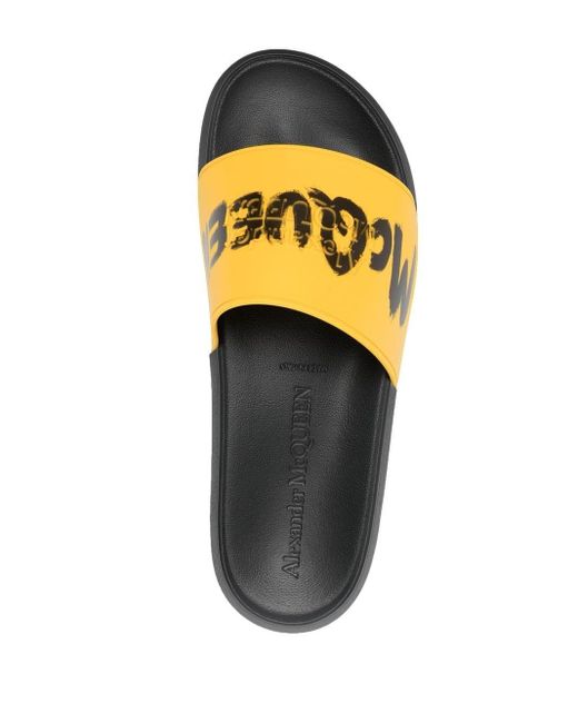 Alexander McQueen Graffiti logo Slip on Slides in Yellow for Men