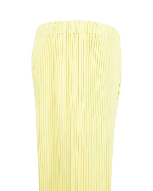 Homme Plissé Issey Miyake Yellow Pleated Trousers for men