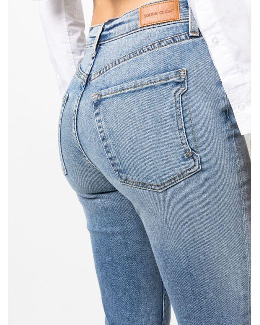 Cotton Citizen Bootcut Denim Jeans in Blue Lyst