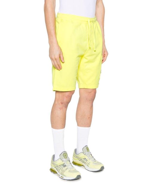 Shorts sportivi con applicazione Compass di Stone Island in Yellow da Uomo