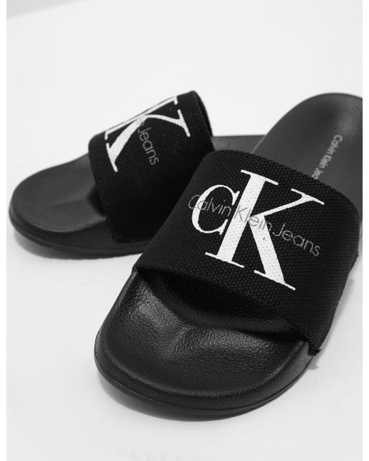 calvin klein slides women's white