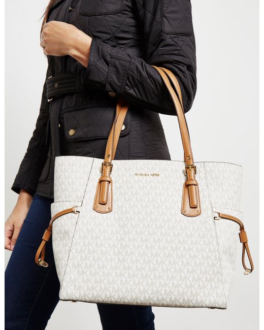 michael kors signature voyager tote