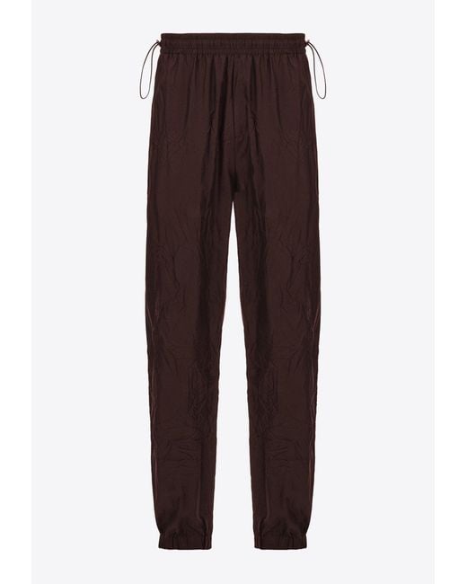 Ferragamo Brown Logo Patch Drawstring Track Pants for men